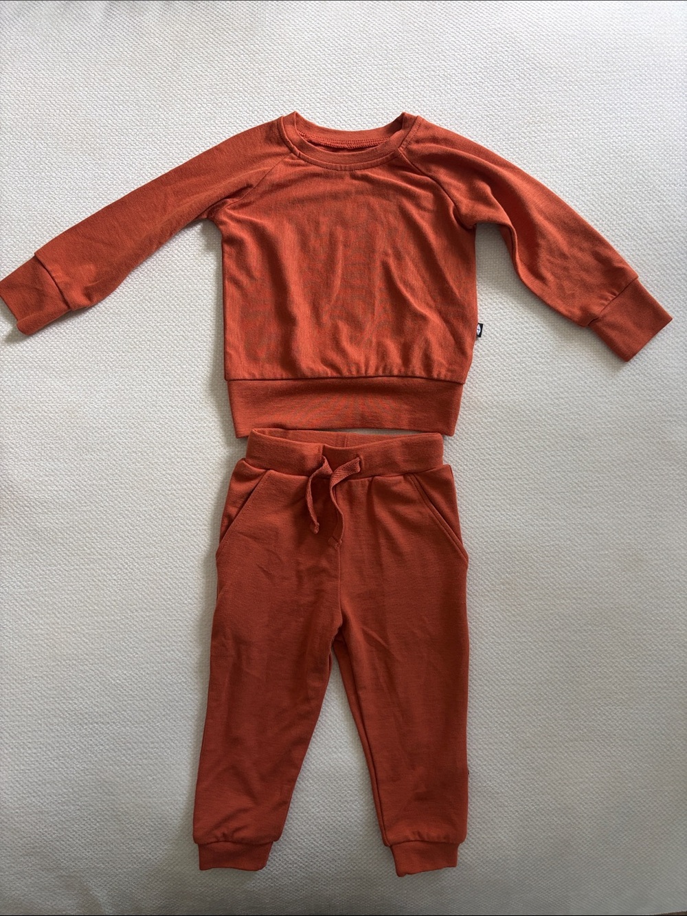 Kyte BABY Bamboo Jersey Jogger Set in Rust